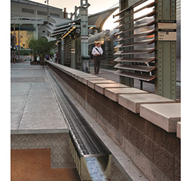 hydraulically superior sloped trench drain